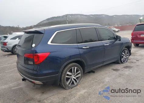 2016 Honda Pilot Touring z USA, uszkodzony, nr VIN 5FNYF6H97GB092081